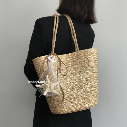 原创时尚海星挂件草编包