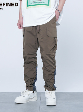 Undefined出品超薄尼龙夏季褶皱裤腿微修身侧口袋装饰束脚工装裤