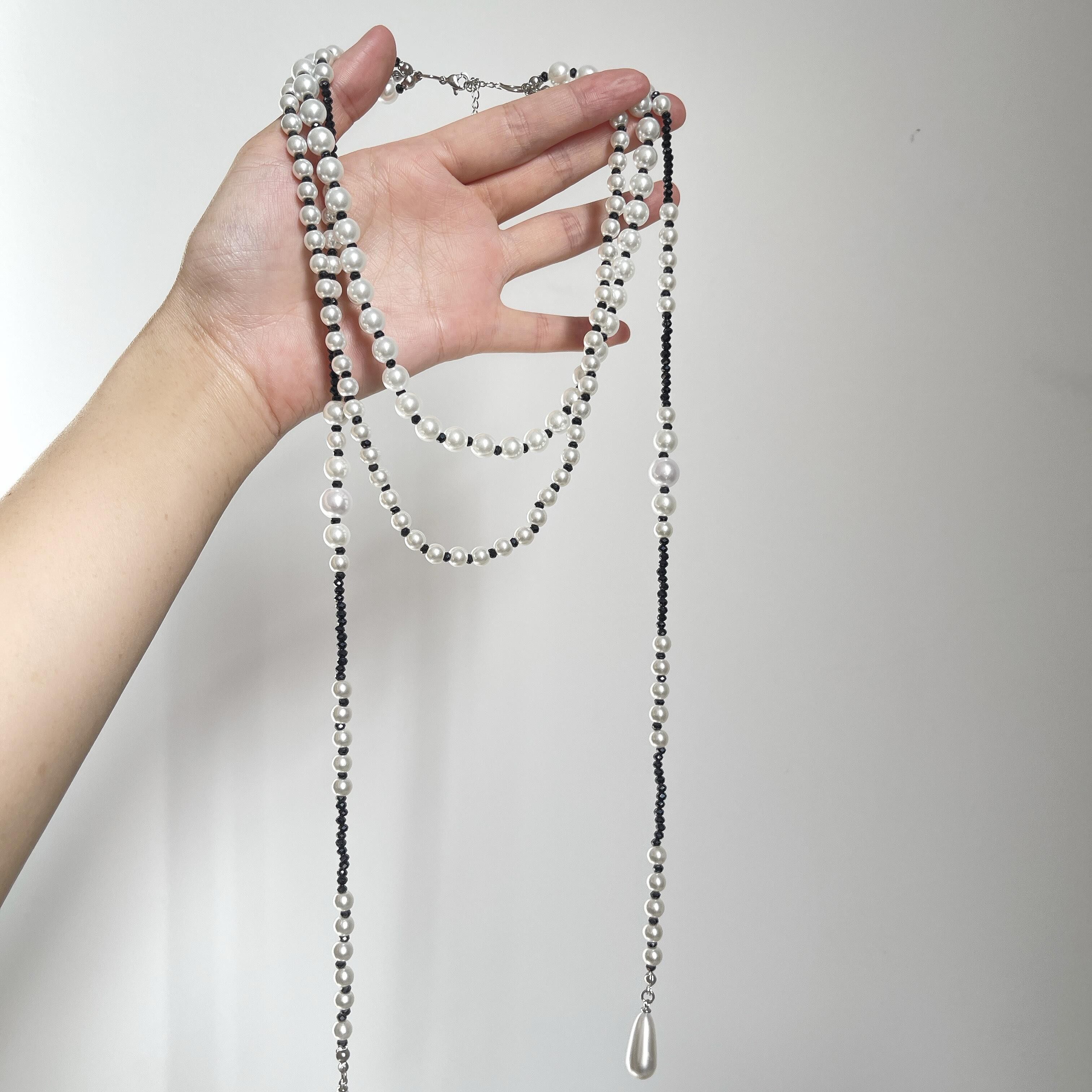 小众设计珍珠黑米珠层叠项链女长款多层编织绳高级感百搭毛衣链潮