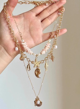 金色贝壳海星珍珠流苏项链女新款海边度假风颈链三层叠戴锁骨链潮