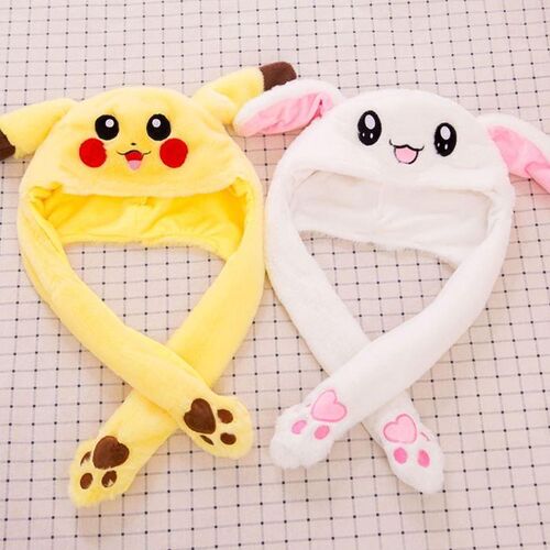 A rabbit plush toy whose hat pinches its ears will move for