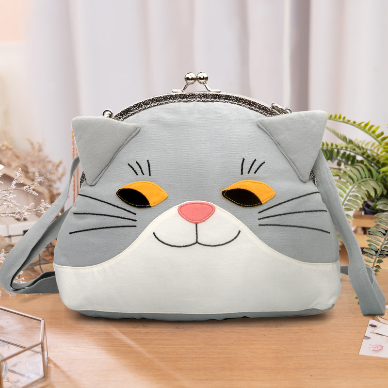 (秒杀!原169,省60)kine猫 调皮猫卡通纯棉布斜挎背包女个性