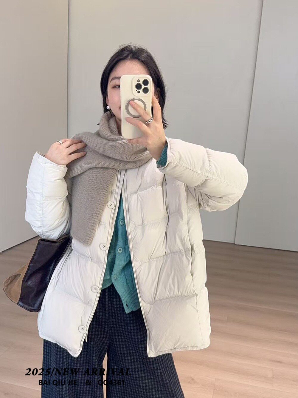 冬款韩系圆领云感泡芙羽绒服女2025简约休闲中长款保暖外套61 01