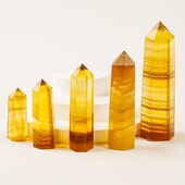2026东海厂家天然黄萤石柱单尖水晶六棱柱能量柱原石打磨办公摆件
