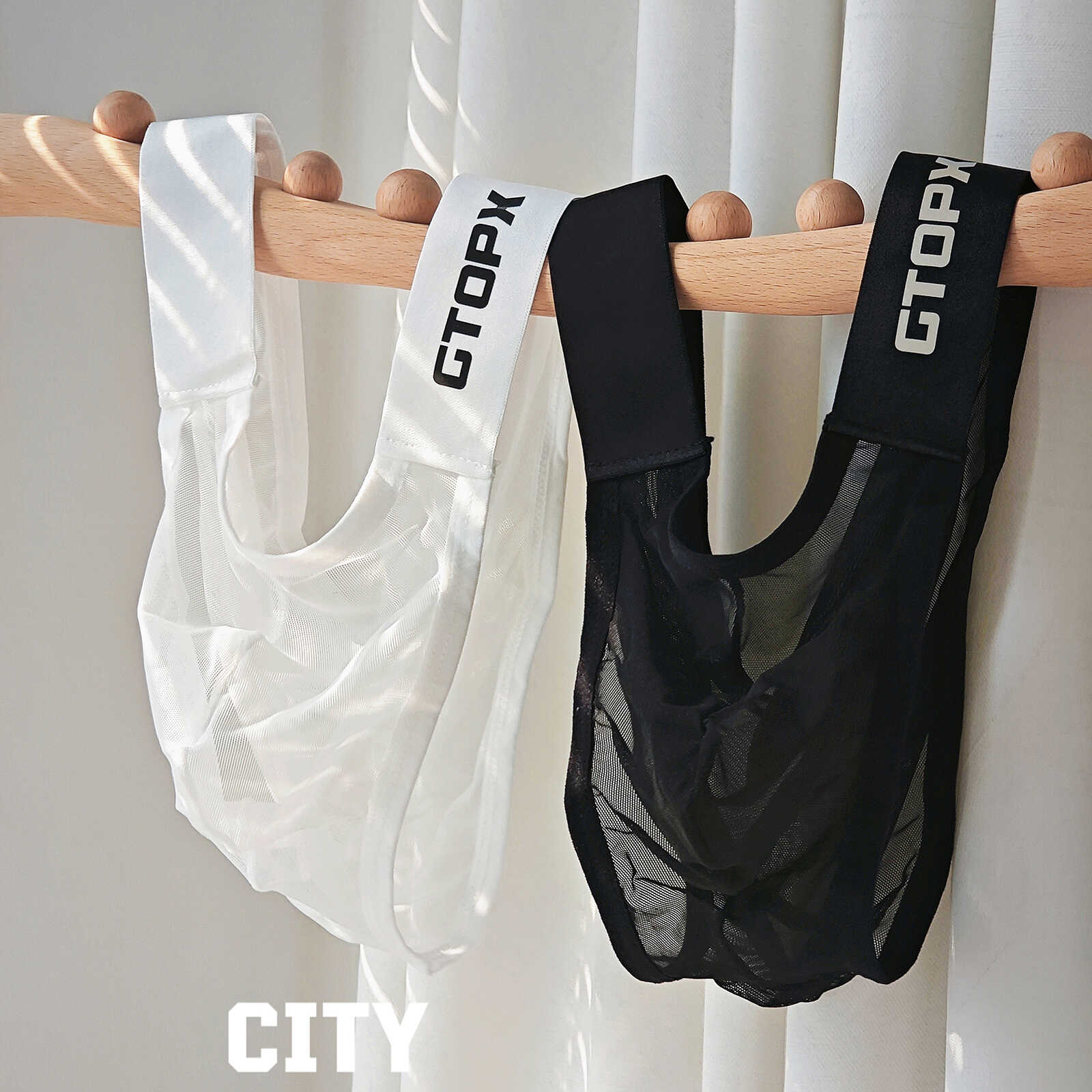 【酷男】两侧腰带三角裤薄款透气U凸性感冰丝透视低腰网纱三角裤