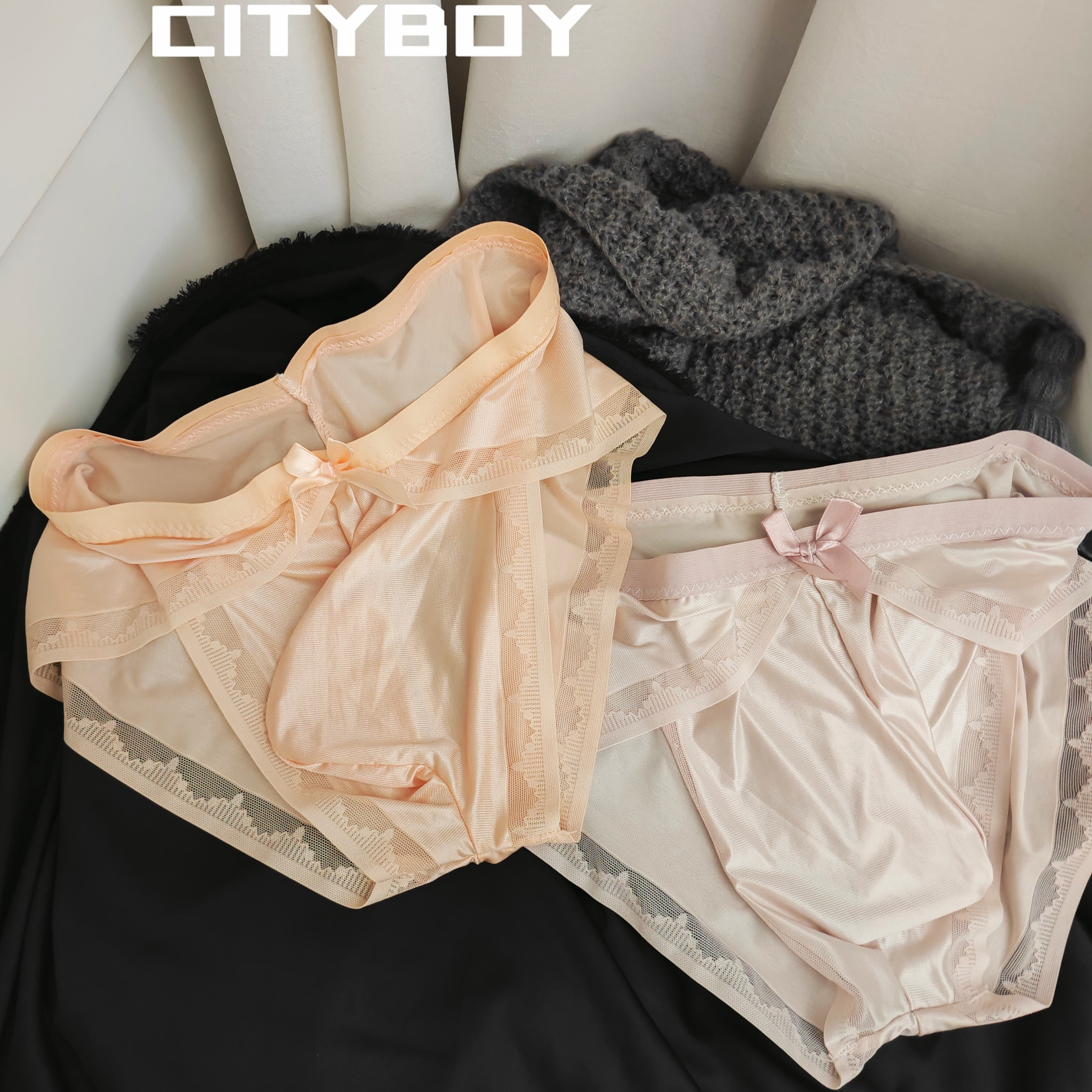 男士冰丝裸感柔软舒适三角裤高叉低腰带花U凸个性无痕性感薄内裤