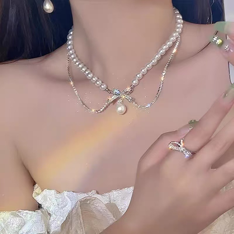 浪漫出逃~双层蝴蝶结珍珠项链女款轻奢小众优雅贵气锁骨链颈链潮