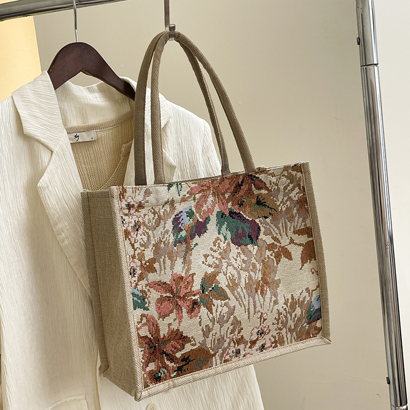 森系文艺编织亚麻托特包2025新油画风通勤单肩包上班手提袋妈咪包