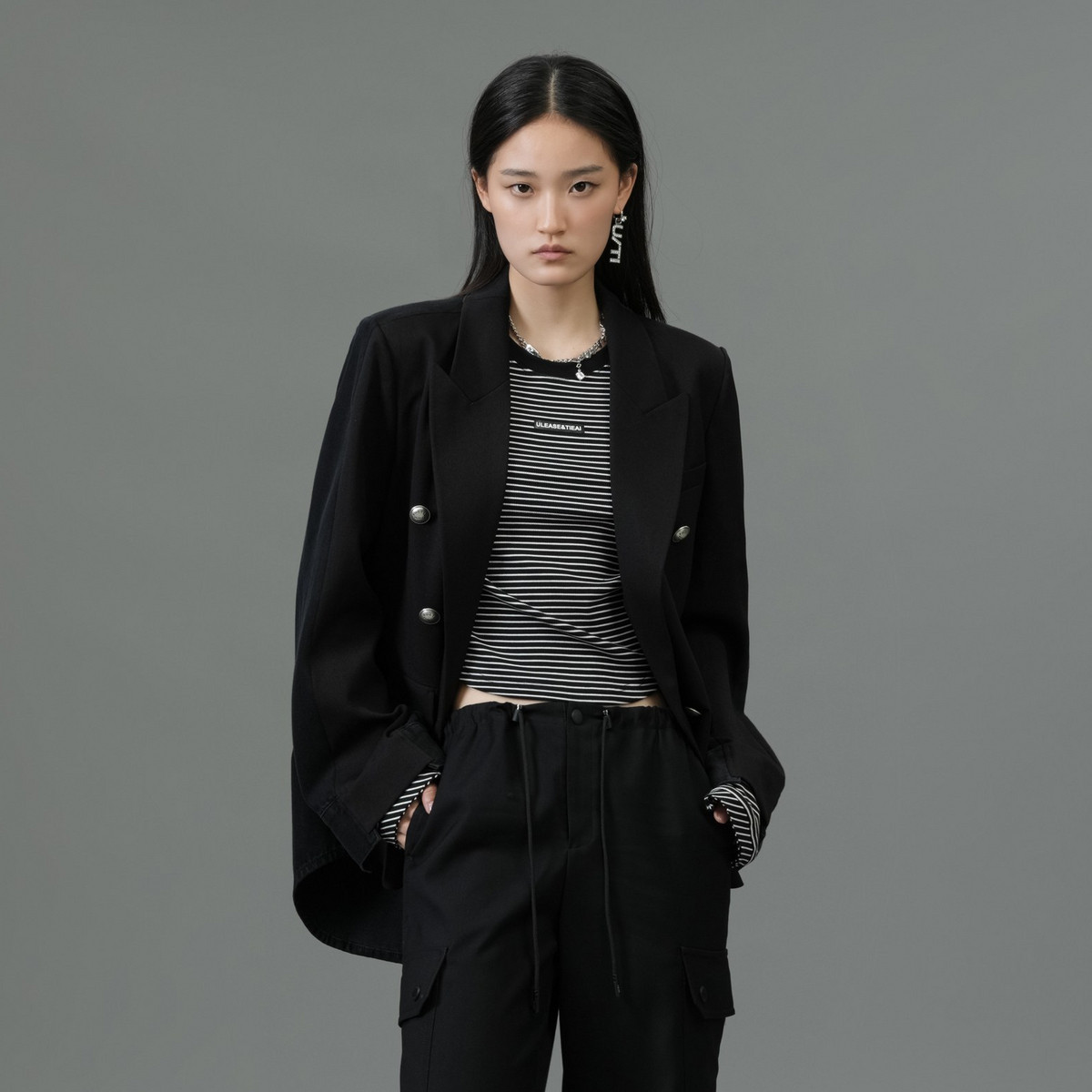 uti黑色设计感拼接西装女