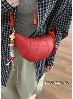 韩国牛角包包女2025新款潮时尚小众马鞍包百搭ins斜挎包红色小包