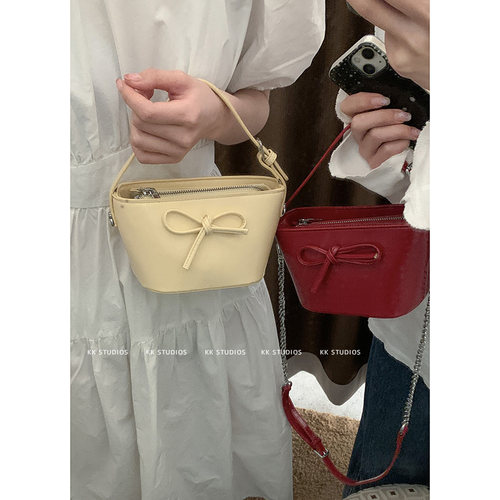 卡乐儿韩版蝴蝶结手提红色水桶包