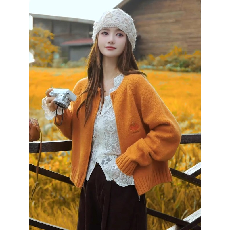 秋季多巴胺橘色针织开衫茶里茶气别致上衣套装女正肩毛衣甜妹穿搭