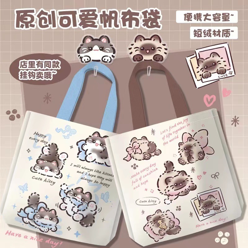 可爱新款大容量学生猫猫帆布包女补习袋通勤手提单肩包敞口袋布偶