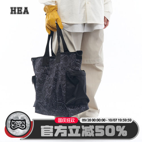 HEA 潮牌醒狮新款手提包日常休闲百搭满印醒狮简约包包男女同款