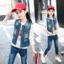 Áo vest trẻ em denim cho bé gái 2019 mùa xuân và mùa thu mới mặc mẫu mỏng mặc áo vest trẻ em lớn phiên bản Hàn Quốc - Áo ghi lê áo thun trẻ em