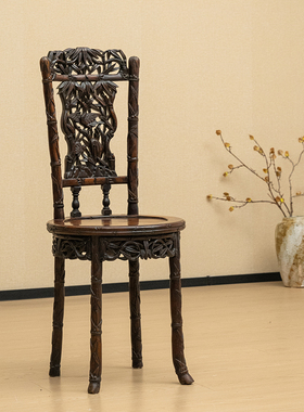 红木透雕仙鹤竹叶纹圆座靠背椅