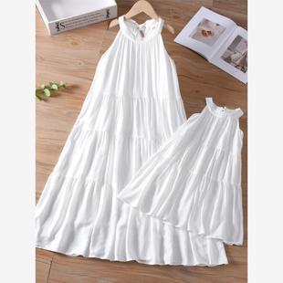法式茶歇气质亲子装母女夏季挂脖沙滩裙海边度假可扎染白色连衣裙
