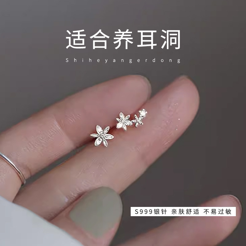 S999纯银针不对称花朵耳钉图片