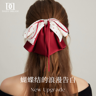 酒红色缎面蝴蝶结发夹女2025新款波点飘带抓夹饱满后脑勺红色发饰