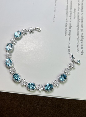 星赞轻奢珠宝轻奢S925银镶嵌约10克拉天然伦敦蓝托帕石椭圆形手链