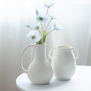 Ancient silent INS with a white-coloured flower decorated li