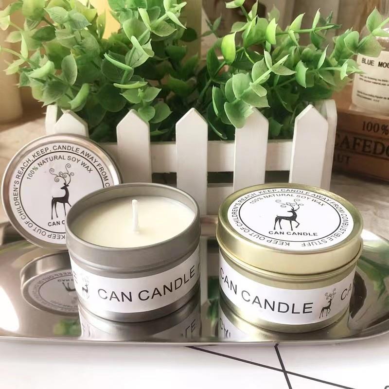 Gold cans and candles with smoke-free soy wax and golden tin