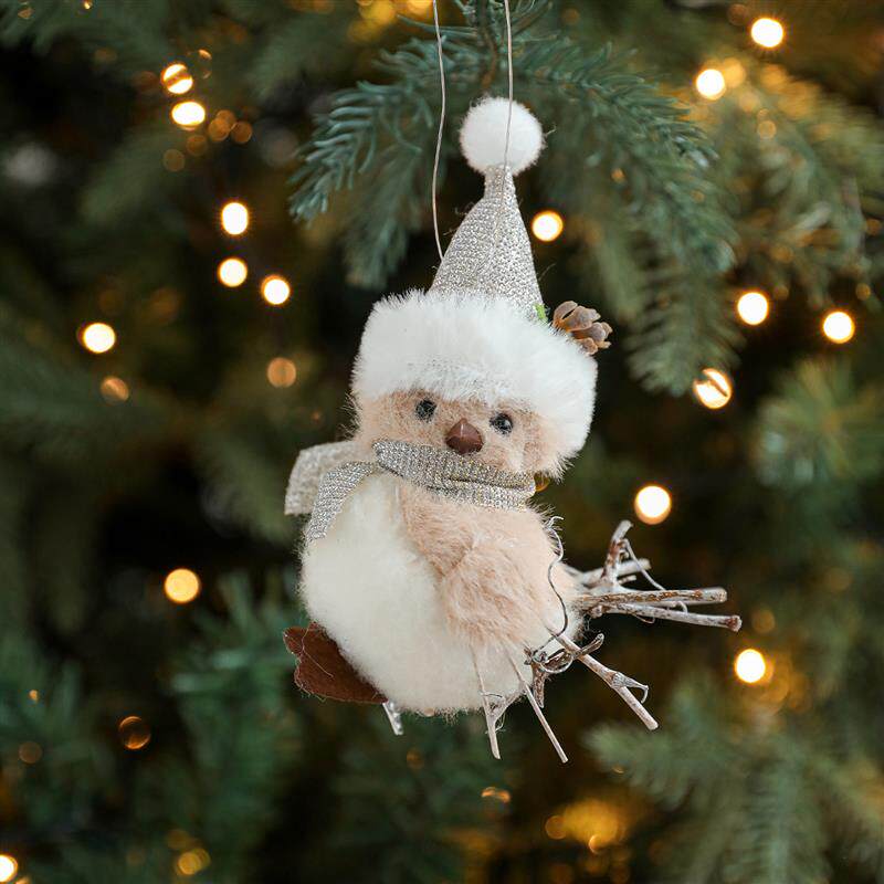 The gray velvet little bird hangs a tree branch like a pine-