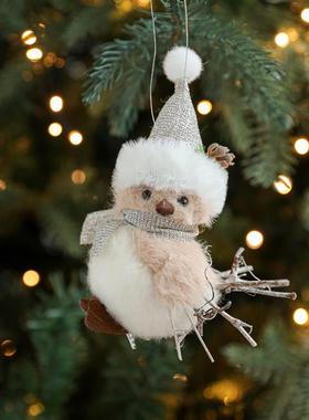 The gray velvet little bird hangs a tree branch like a pine-