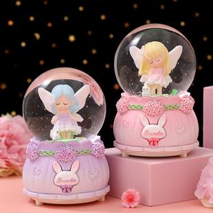 A beautiful childs gift with a musical crystal ball on the