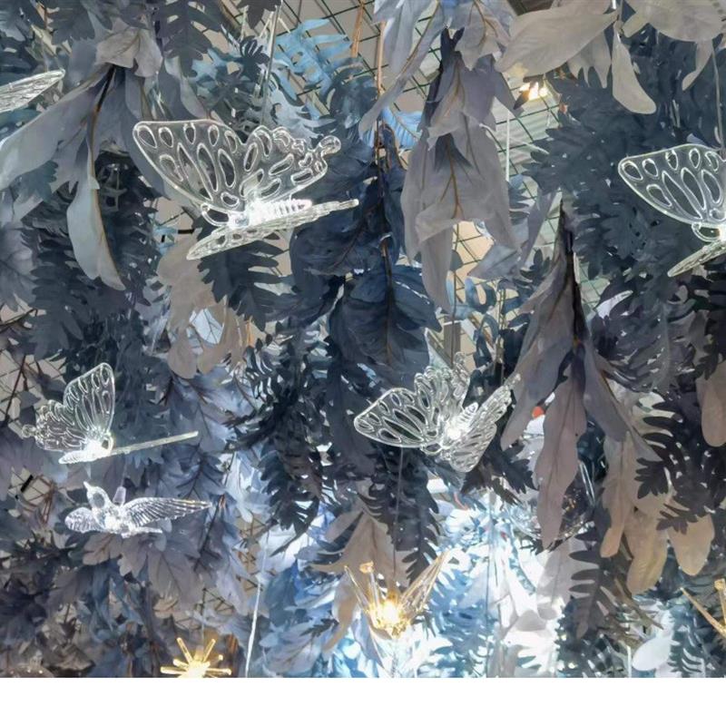 Its a wedding party with a sparkling butterfly hanger, a we