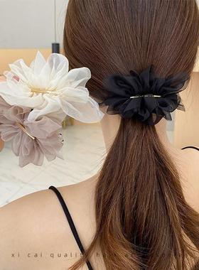 A super-fantastic snow-wielding flower with a girls head in