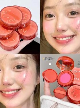 Its an orange cream cake with a red beam, and its an expan