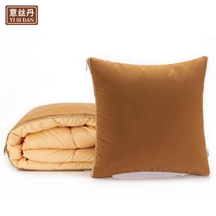 The pillows are put on the bus couch and the double office i