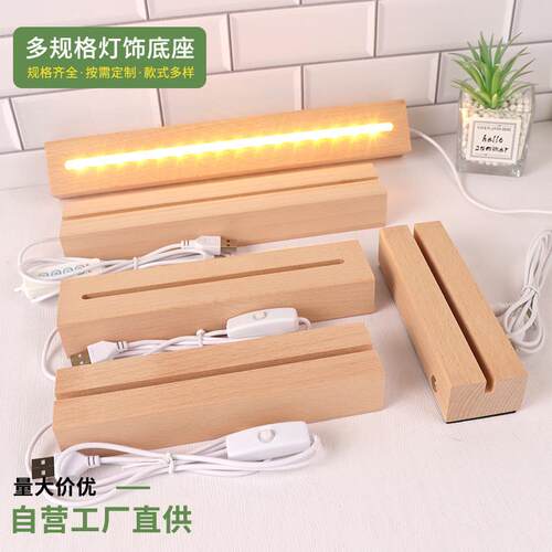 A diagonal light, a rectangular wooden luminous base.