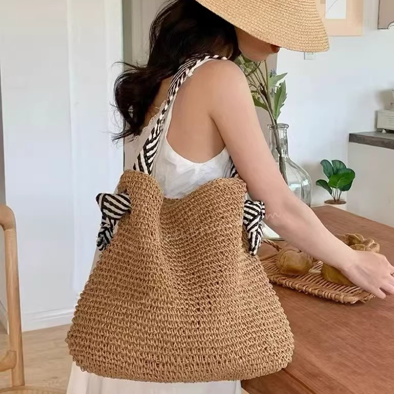 草编包包女2025新款百搭海边度假手工编织包大容量单肩腋下沙滩包