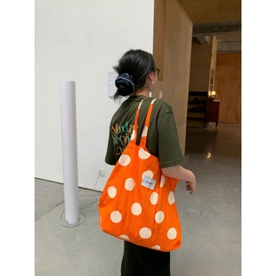 夏日度假休闲橙色波点帆布包单肩印花布袋包大容量百搭时髦购物袋