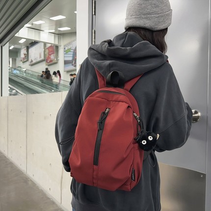 迷你双肩包2025新款小型轻便女小书包男红色旅游旅行女士小号背包