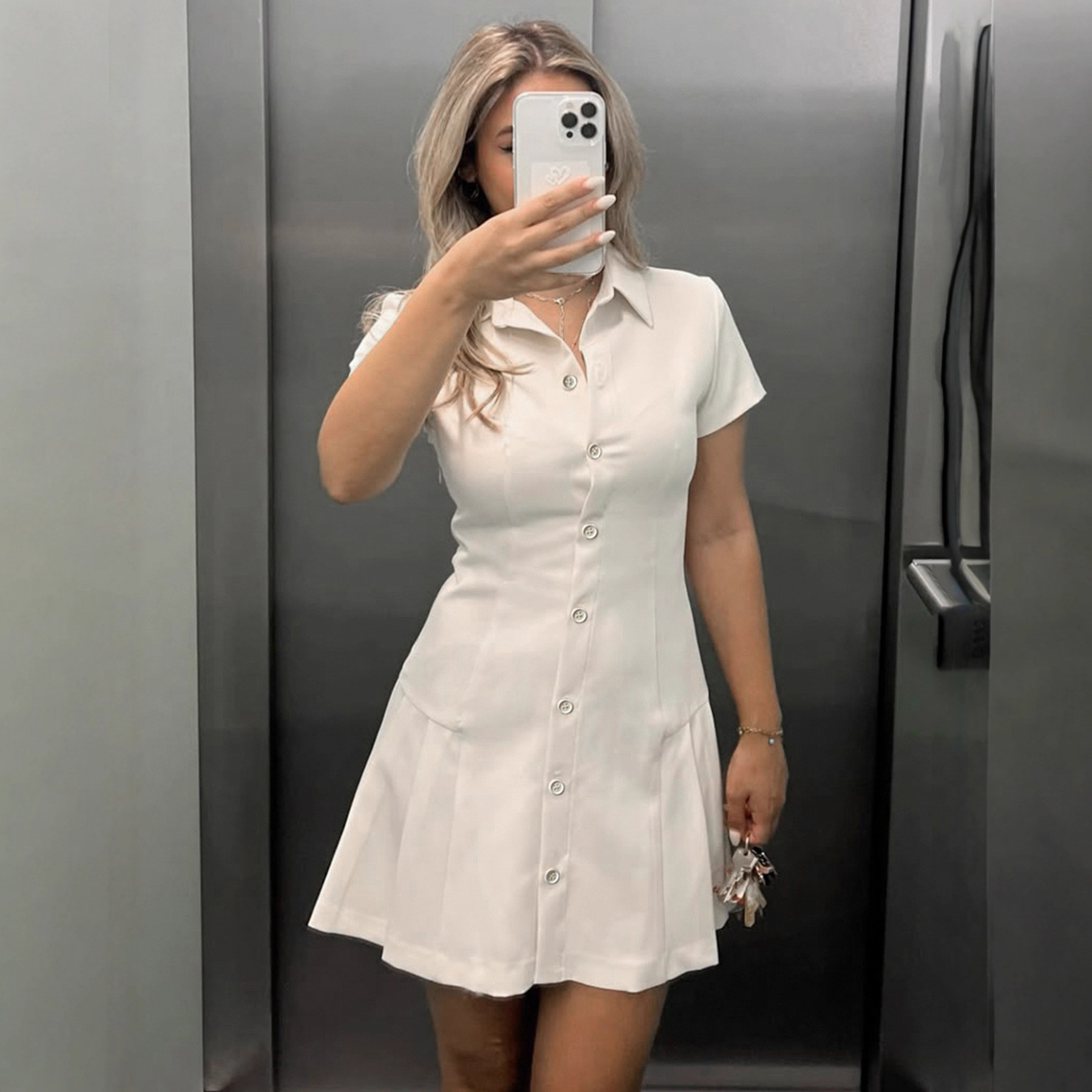 美式POLO领纯色气质排扣褶皱收腰显瘦衬衫A字短款连衣裙2025新款