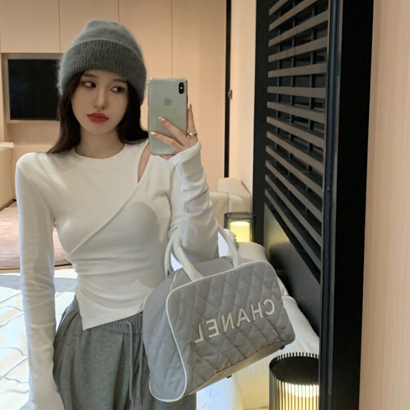 潮牌1212新款正肩白色长袖t恤女春秋不规则交收腰镂空短款上衣