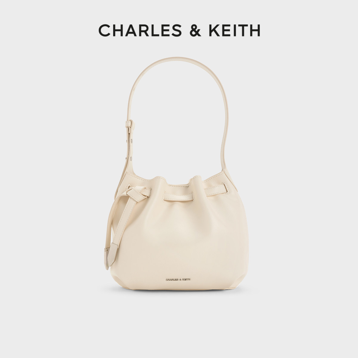 CHARLES&amp;KEITH25秋新款CK2-10271627时尚绑带简约单肩斜挎水桶包