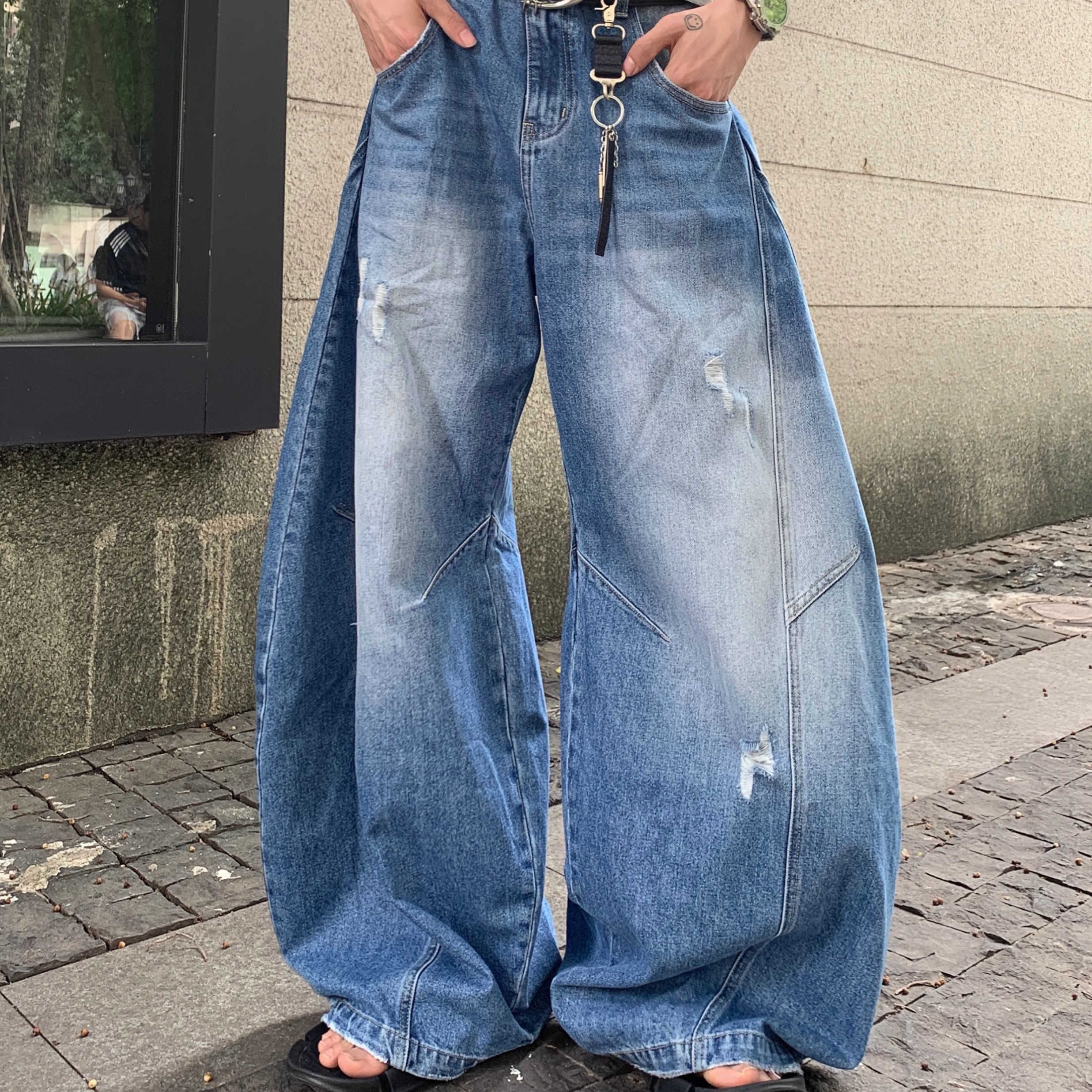 水洗磨破做旧弯刀牛仔裤男女