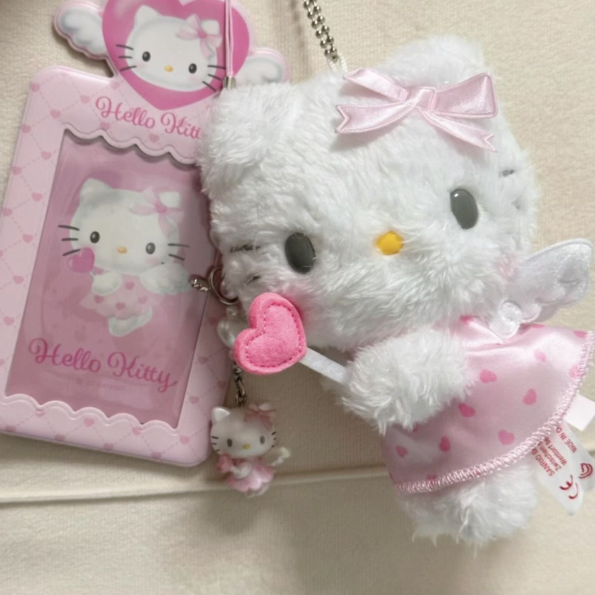 hellokitty挂件黑皮包包书包KT猫小饰品毛绒公仔爱神降临哈喽kitt