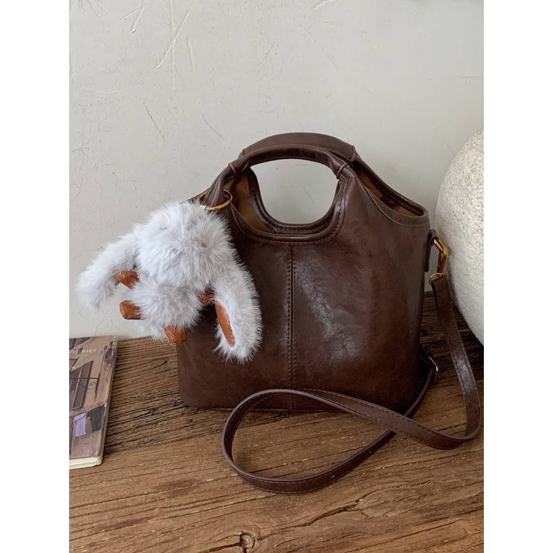 专柜品牌时尚手提水桶包包女2025秋冬新款单肩包简约高级感通勤斜,箱包皮具/热销女包/男包,水桶包,淘宝优惠券,粉丝福利购,淘宝优惠卷