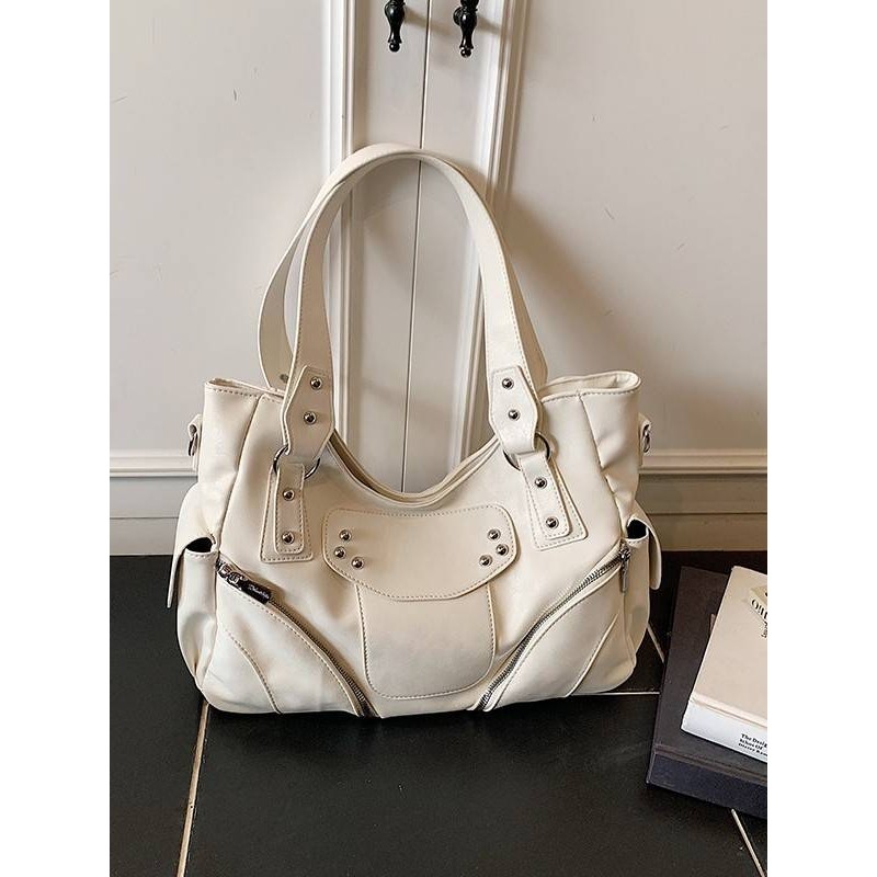 专柜品牌铆钉通勤托特包机车包女新款潮小众设计单肩包复古百搭斜,箱包皮具/热销女包/男包,托特包,淘宝优惠券,粉丝福利购,淘宝优惠卷