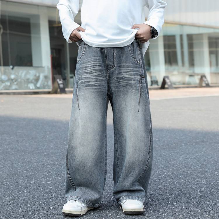 专柜品牌男童牛仔裤2026秋季新款中大童宽松弯刀水洗裤子潮牌百搭