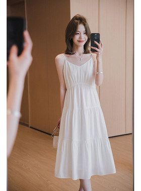 小谷粒白色吊带连衣裙2026春季新款性感气质简约度假风中长款裙子