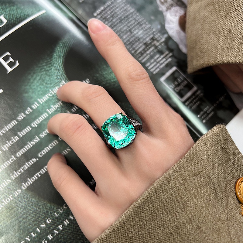 新款铜镀枪黑色仿帕拉伊巴绿碧玺戒指女款仿彩宝镶钻戒子开口指环