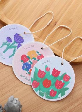 Circular flower-shaped wood pulp sponge, compressed and wate