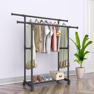 Floor-standing clothes drying rack with dual extendable and