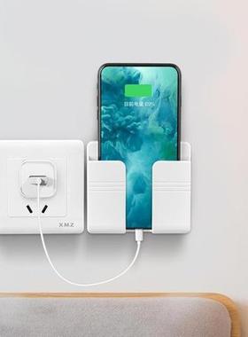 Wall-mounted adhesive phone charging dock and remote control